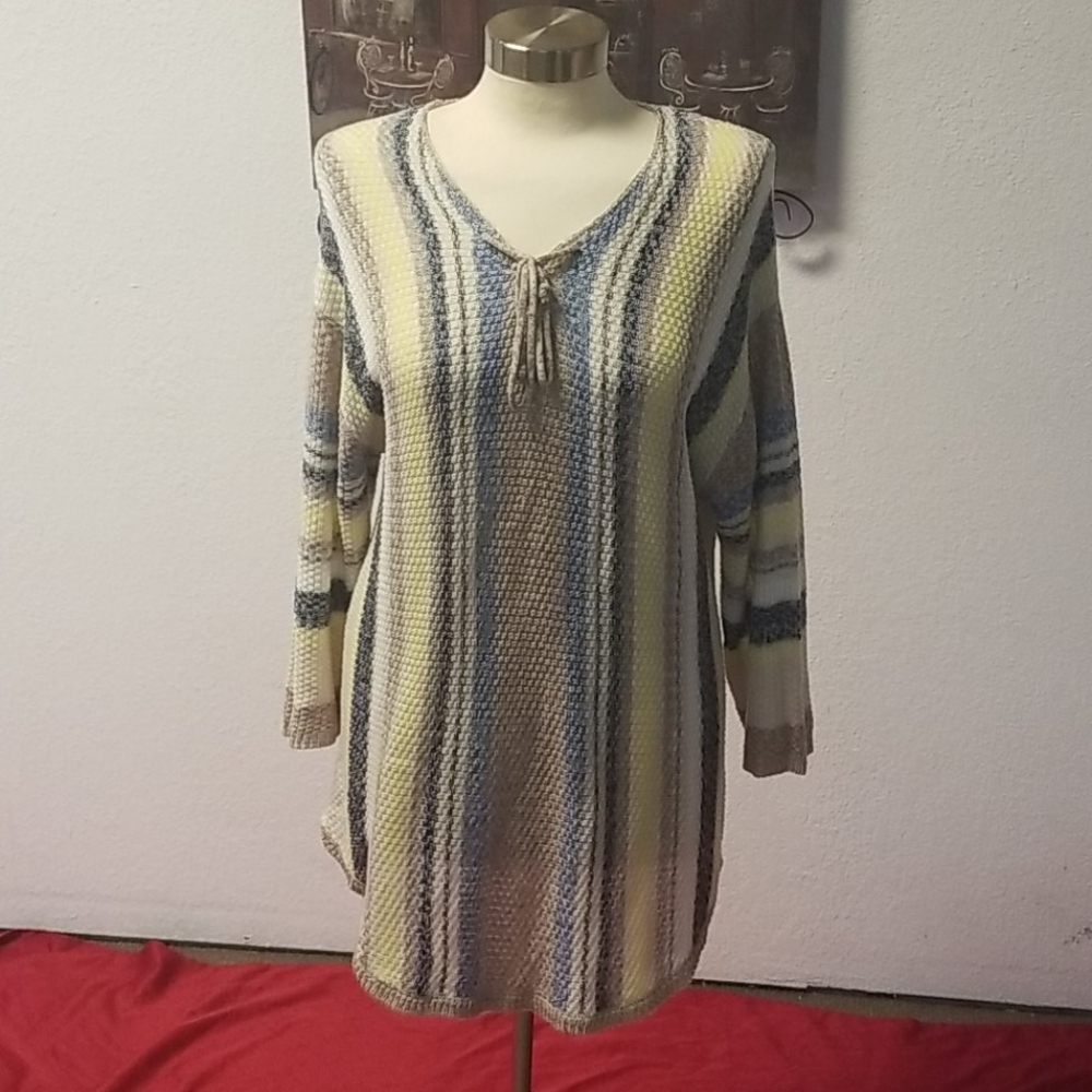 Stripped throw over sweater/blouse